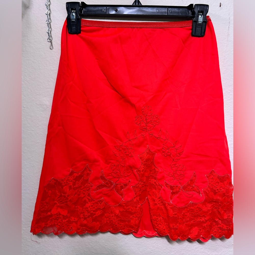 Red slip skirt with lace detail